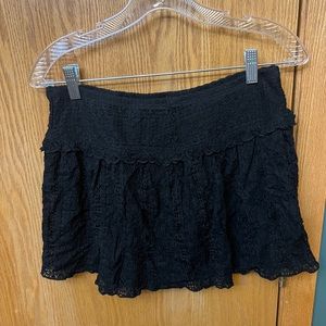 Black lace mini skirt